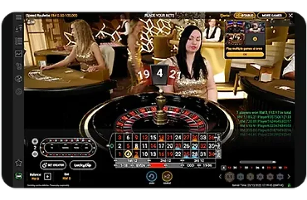 Speed Roulette table with dealer, showing roulette wheel and betting options.
